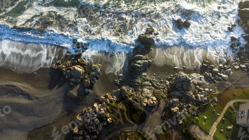 Preview: An Aerial Shot Of The Coastal Edge Of The Rocas Sector Of Santo Domingo, Chile At Sunset
