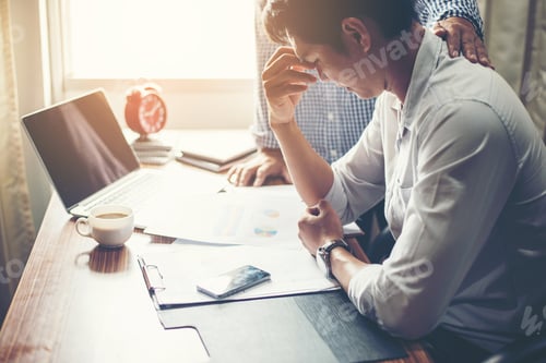 Preview: Serious Young Businessman Looking At Financial Report Seem Like Something Mistake With His Boss In