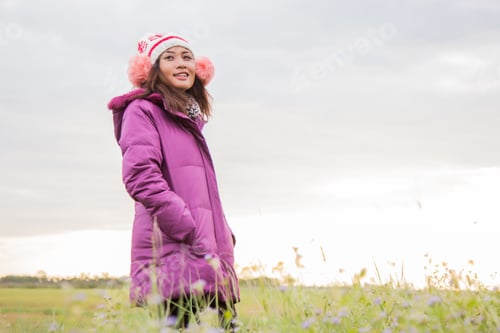 Preview: Young Woman Was Playing In A Field Of Flowers In The Winter Air.