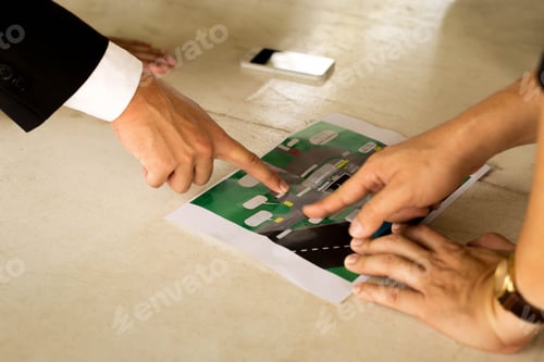 Preview: Business Pointing On Map Location Information On The Table