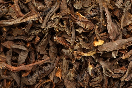 Preview: A Top View Of Dry Tea Leaves