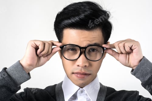 Man Adjusting Stylish Black Framed Glasses Close Up