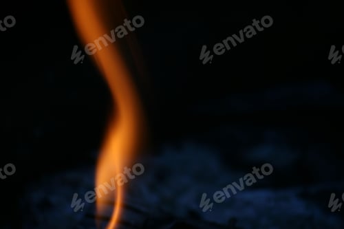 Preview: A Closeup Shot Of A Fire Flame In The Dark