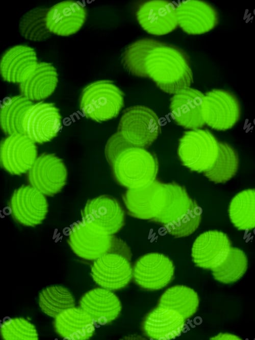Preview: Green Abstract Circular Lights Blurred Bokeh Holiday Background Of Christmas Light