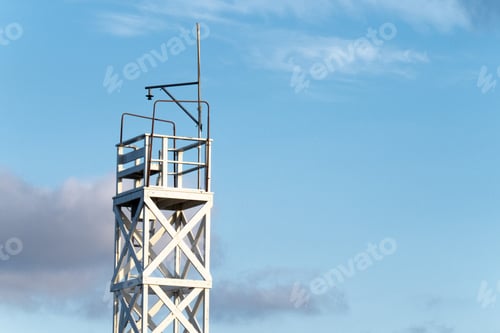 Preview: A White Wooden Climbing Tower On A Blue Sky Background
