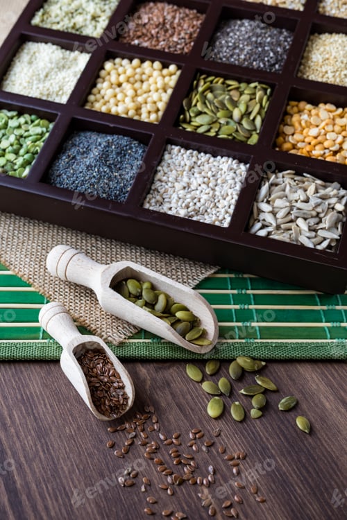 Preview: Top Down View Of A Wooden Box Filled With Various Seeds And Grains.
