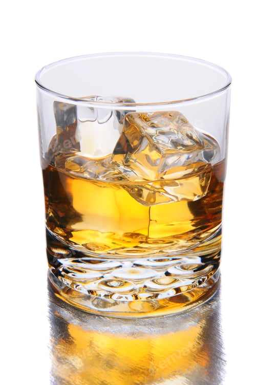 Preview: Closeup Of A Glass On Whiskey On The Rocks With Reflection. Vertical Format On A White Background.