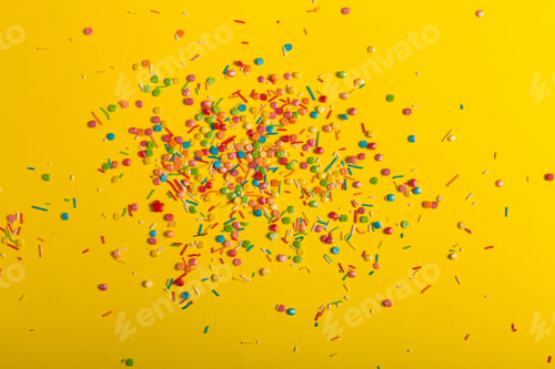 Preview: Colorful Sprinkles On A Yellow Background