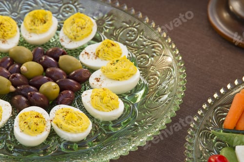 Preview: Deviled Eggs, Kalamata And Green Olives Served With Carrots, Jimaca And Cherry Tomatoes As A Before