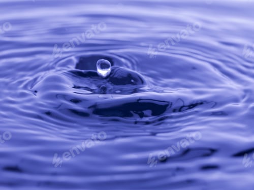 Preview: Water Drop Falling Into Blue Water Abstract Background