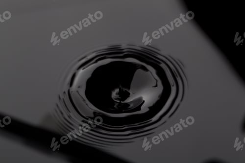 Preview: Close Up Water Droplet Affect The Surface, Forming Rings On The Surface And Making A Perfect