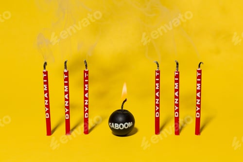 Preview: Red Dynamite Birthday Candles Blown Out On A Bright Yellow Background