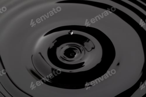 Preview: Close Up Water Droplet Affect The Surface, Forming Rings On The Surface And Making A Perfect