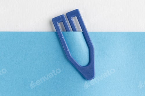 Preview: Paperclip Attached To Notepaper Closeup