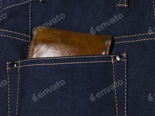 Preview: Wallet in pocket of dark blue jeans