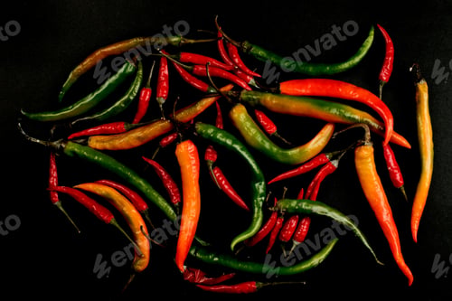 Preview: Hot Chili Thai Fingerling Peppers Spread Out Flat Lay On Black