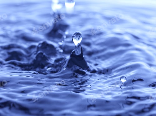 Preview: Water Drop Falling Into Blue Water Abstract Background