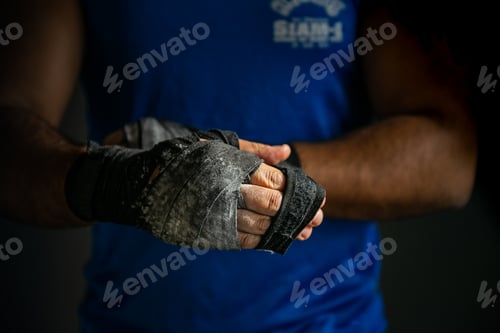 Preview: Pulling On Black Cloth Hand Wraps