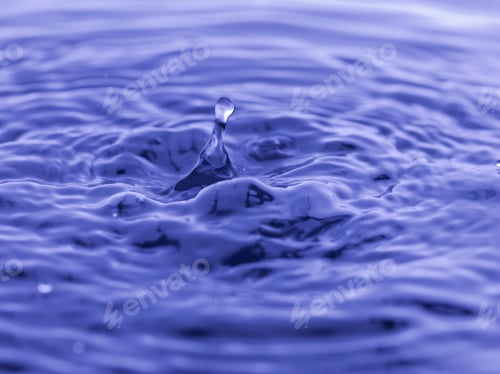 Preview: Water Drop Falling Into Blue Water Abstract Background