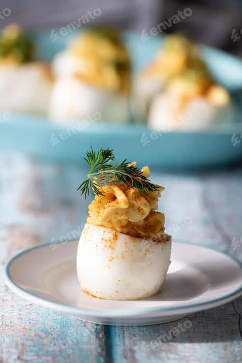 Preview: A Close Up View Of Deviled Eggs Ready For Eating.