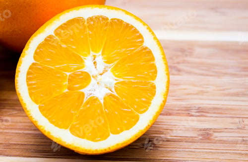 Preview: Half Of A Orange On A White Background