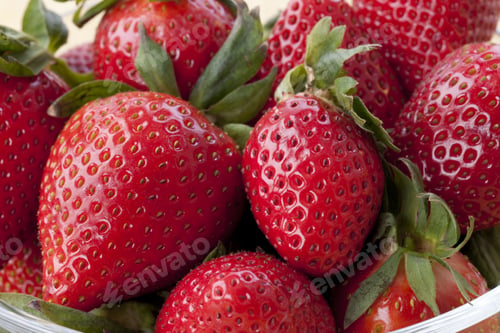 Preview: Strawberries In A Glass Bowl On Wooden Table