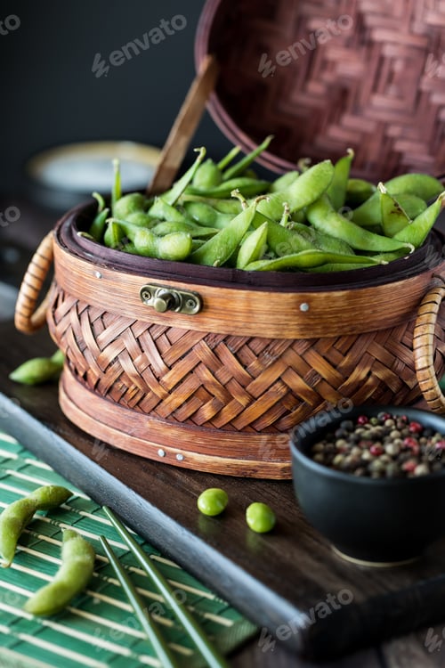 Preview: Close Up View Of A Wicker Basket Filled With Edamame Beans Ready For Snacking.