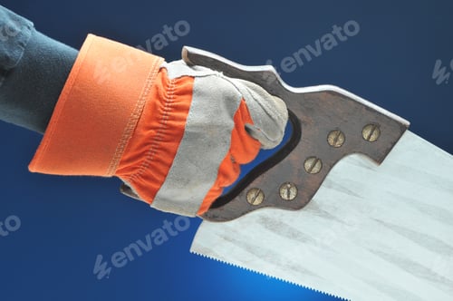 Preview: Construction Worker Hand And Arm With Saw Over Blue Gradient Background