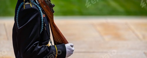 Preview: An Army Soldier, In White Gloves, Carrying His Weapon On Guard Duty.