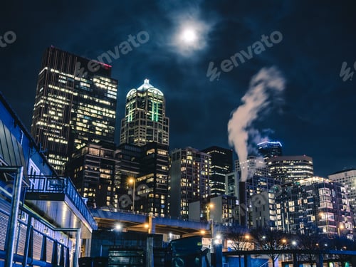 Preview: Abstract Angle Below Night Cityscape With Hazy Clouds