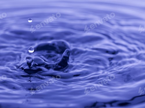Preview: Water Drop Falling Into Blue Water Abstract Background