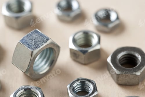Preview: Industrial Nuts On Wood Background