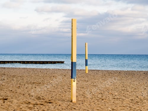 Preview: Empty Beach Volleyball Net Posts At In The Sand By The Sea Shore