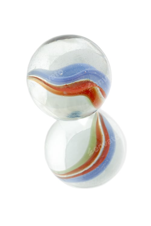 Preview: Image Of A Two Colorful Crystal Marble Aligned Over The White Surface