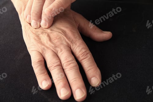 Preview: Senior Man With Pain On The Back Of His Hand, Copy Space Included
