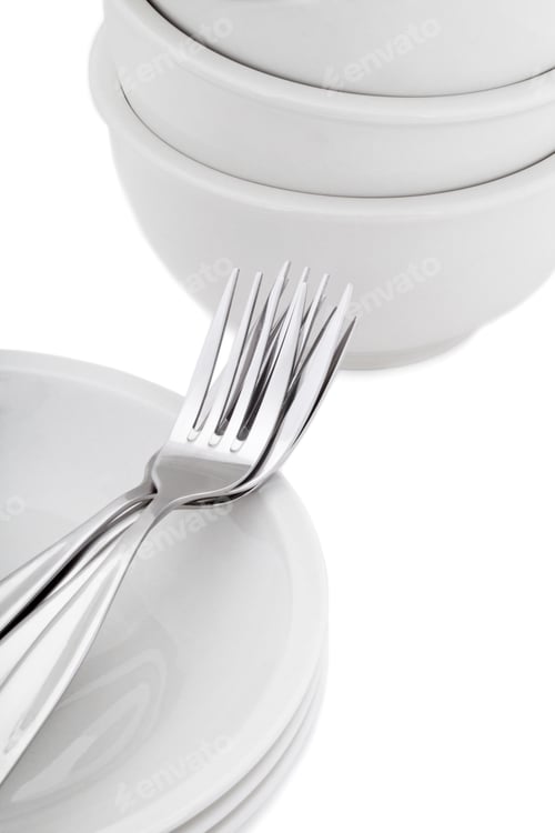 Preview: Cropped Image Of A Dinner Plate With Pieces Of A Fork On A White Background