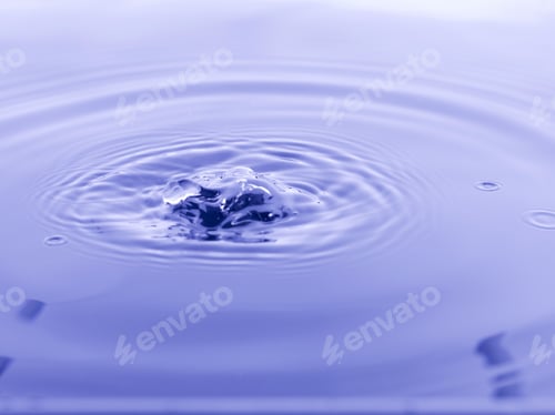 Preview: Close Up Water Droplet Affect The Surface, Forming Rings On The Surface And Making A Perfect