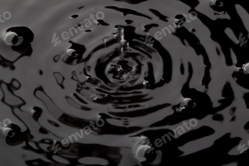 Preview: Close Up Water Droplet Affect The Surface, Forming Rings On The Surface And Making A Perfect