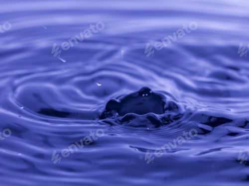 Preview: Water Drop Falling Into Blue Water Abstract Background