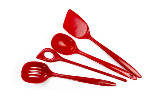 Preview: Overhead View Of A Variety Of Red Spatulas And Cooking Spoons Isolated On White