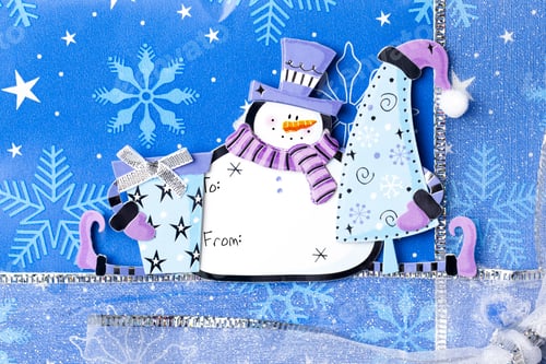 Preview: Closeup Of Festive Christmas Gift Or Present Background With Snowman