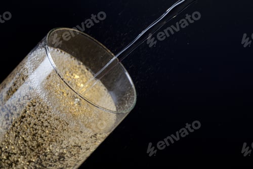 Preview: Champagne Glass Detail On Black Background