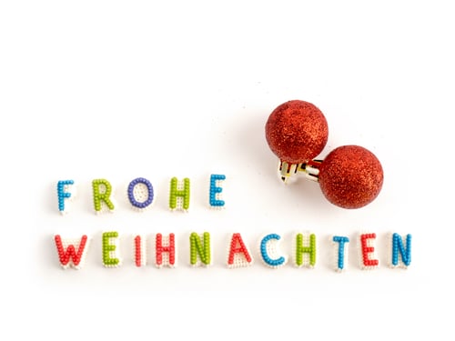 Preview: Frohe Weihnachten In German For Merry Christmas Spelled In Candy Letters Isolated On White