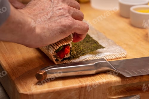 Preview: The Process Of Making Sushi During A Chef'S Demonstration Class In A Home Kitchen