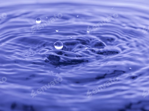 Preview: Water Drop Falling Into Blue Water Abstract Background