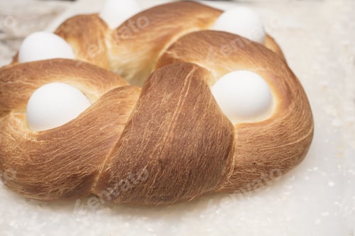 Preview: Braided Easter Bread On A Cutting Board Decorated With Baked Eggs