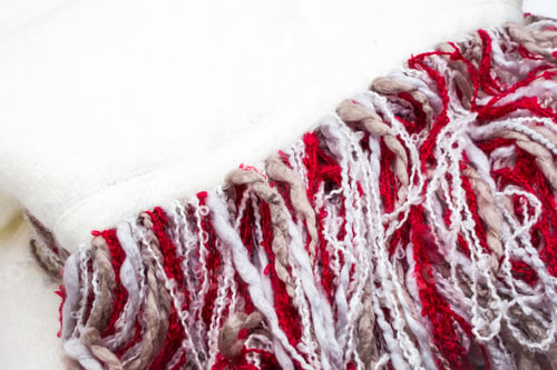 Preview: Close Up Warm White And Red Blanket