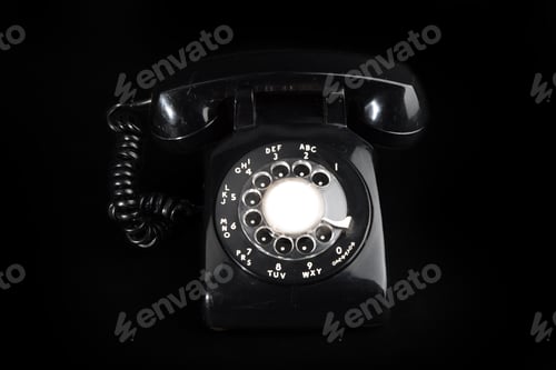 Preview: Black Rotary Telephone On A Black Background
