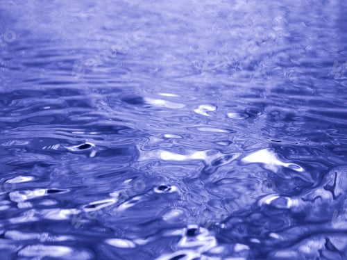 Preview: Gentle Blue Water Ripples with Sunlight Reflections