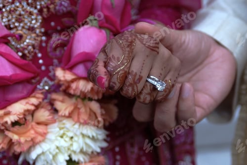 Preview: Bride And Groom Exchanging Rings As Part Of Hindu Wedding Ceremony